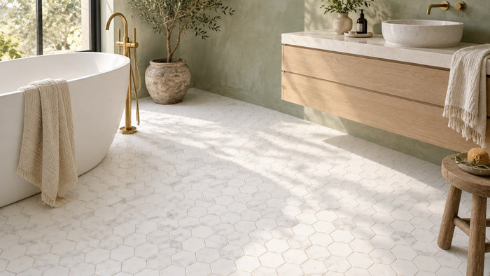 Bathroom tile ideas: white Calacatta T honed marble hexagon mosaic floor in a sage-green bathroom