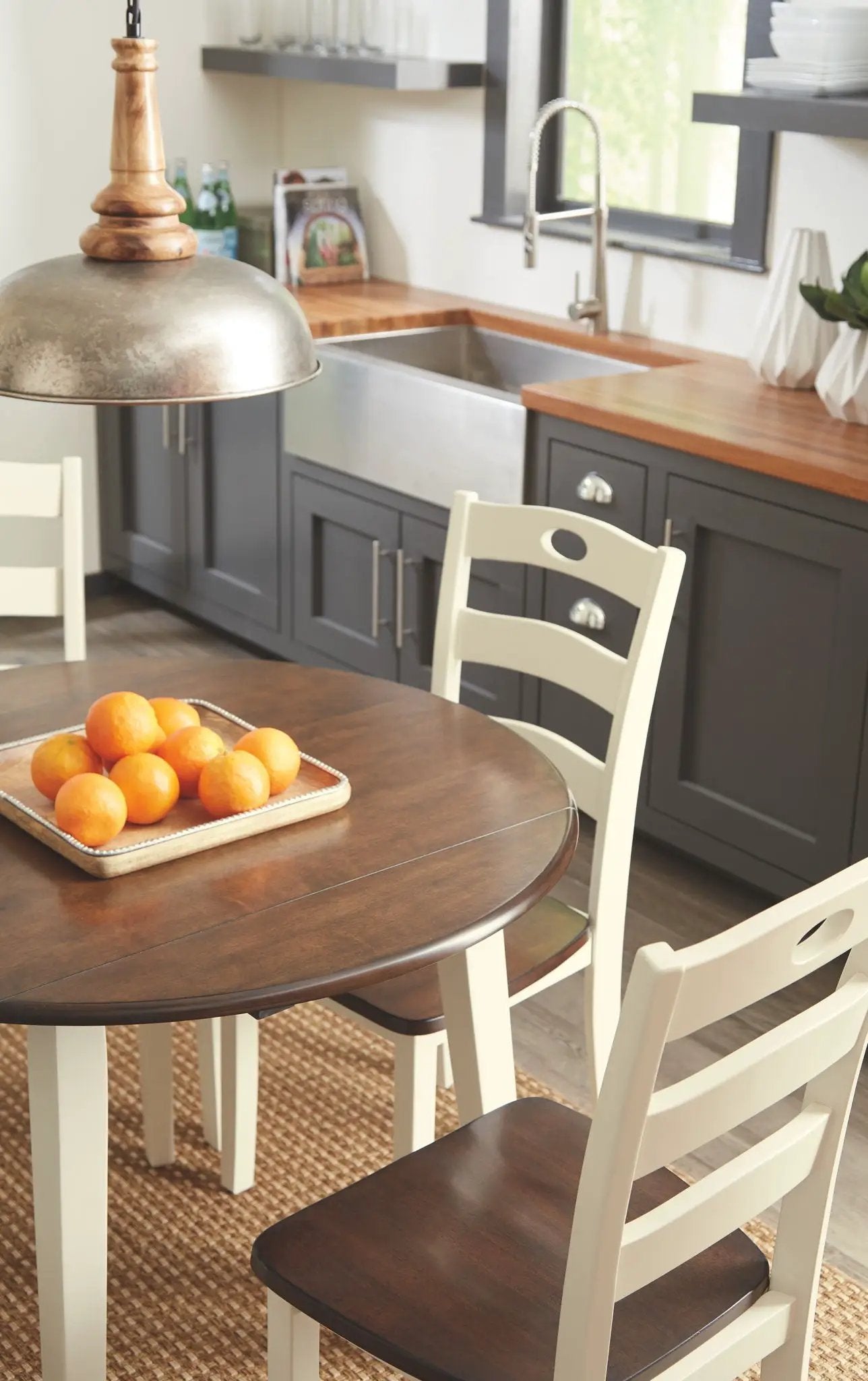 Woodanville - Round Dining Table Set by Unique Piece Furniture