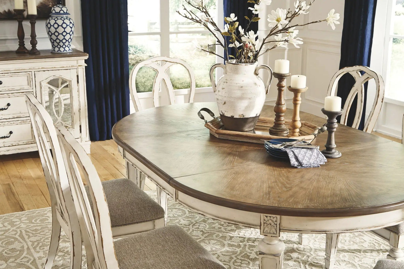 Realyn - Oval Dining Table Set by Unique Piece Furniture