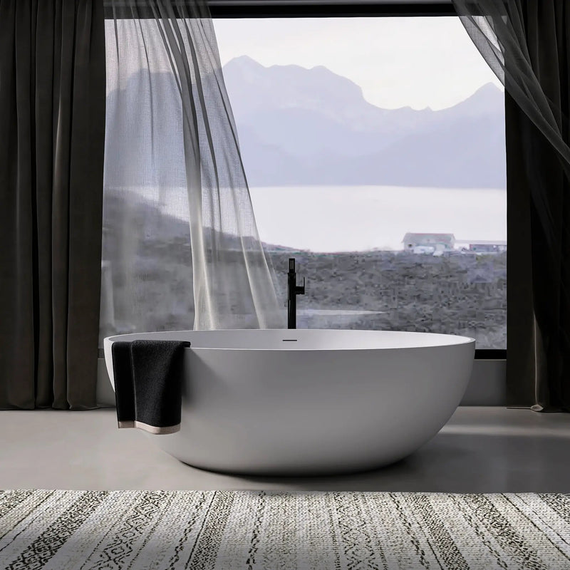 67 Inch Freestanding Solid Surface Soaking Bathtub by HouseOfZazla