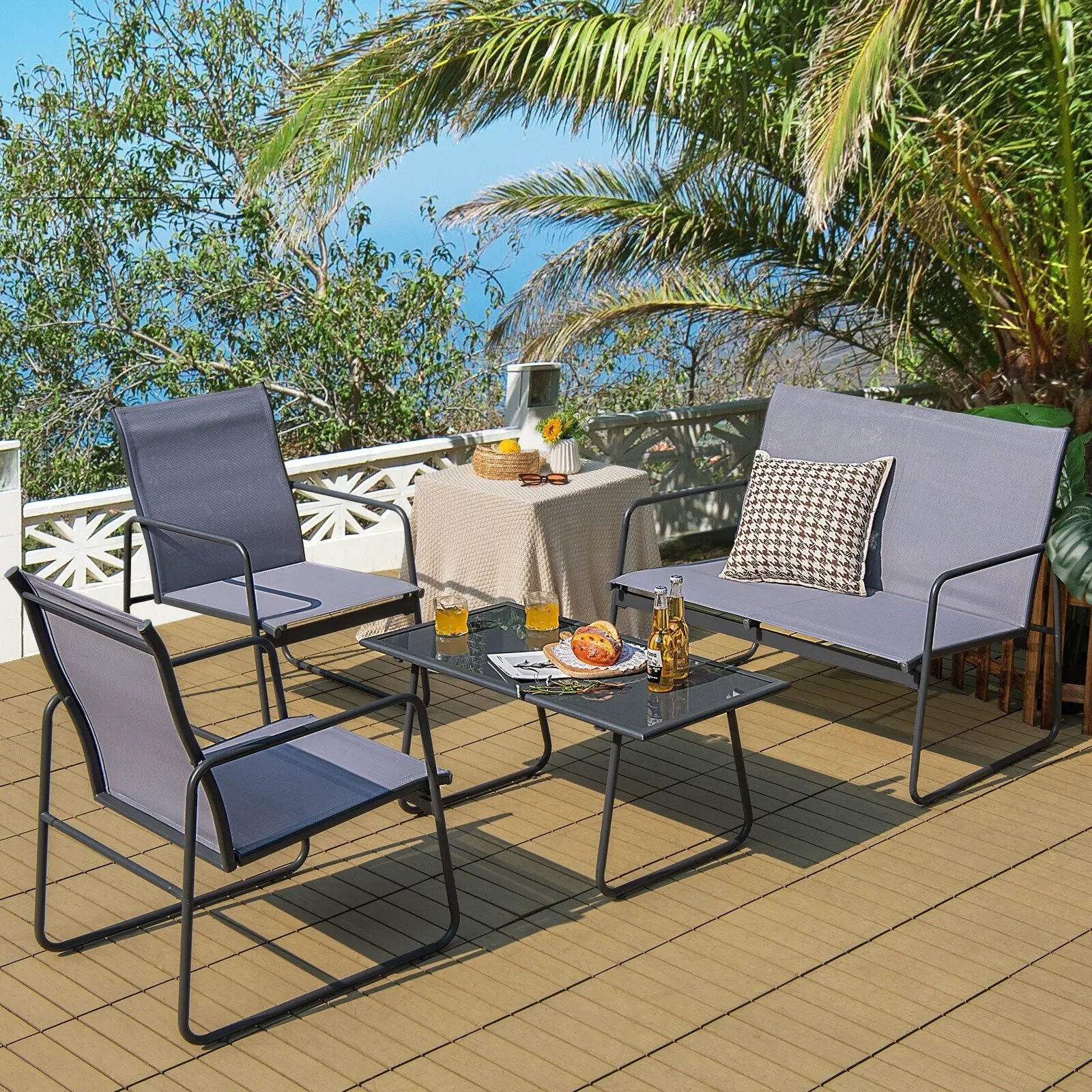 4 Pieces of Metal Patio Furniture Chat Set with Tempered Glass Coffee Table by DirectDeals