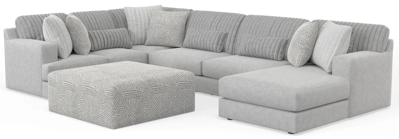 Logan - Upholstered Sectional With Comfort Coil Seating - 46" Cocktail Ottoman And Accent Pillows Included by Unique Piece Furniture
