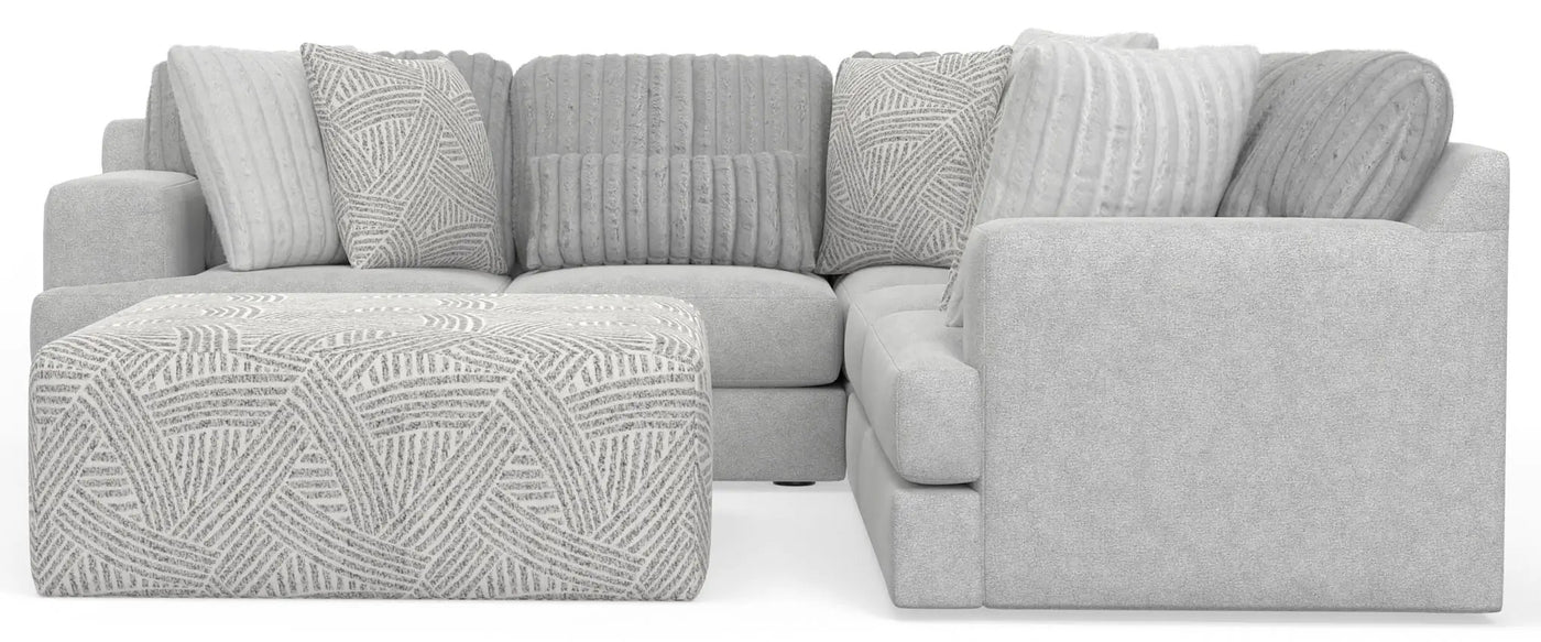 Logan - Upholstered Sectional With Comfort Coil Seating - 46" Cocktail Ottoman And Accent Pillows Included by Unique Piece Furniture