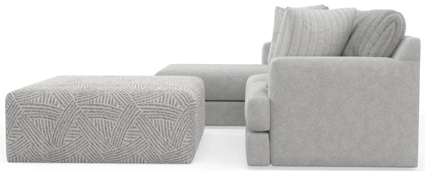 Logan - Upholstered Sectional With Comfort Coil Seating - 46" Cocktail Ottoman And Accent Pillows Included by Unique Piece Furniture