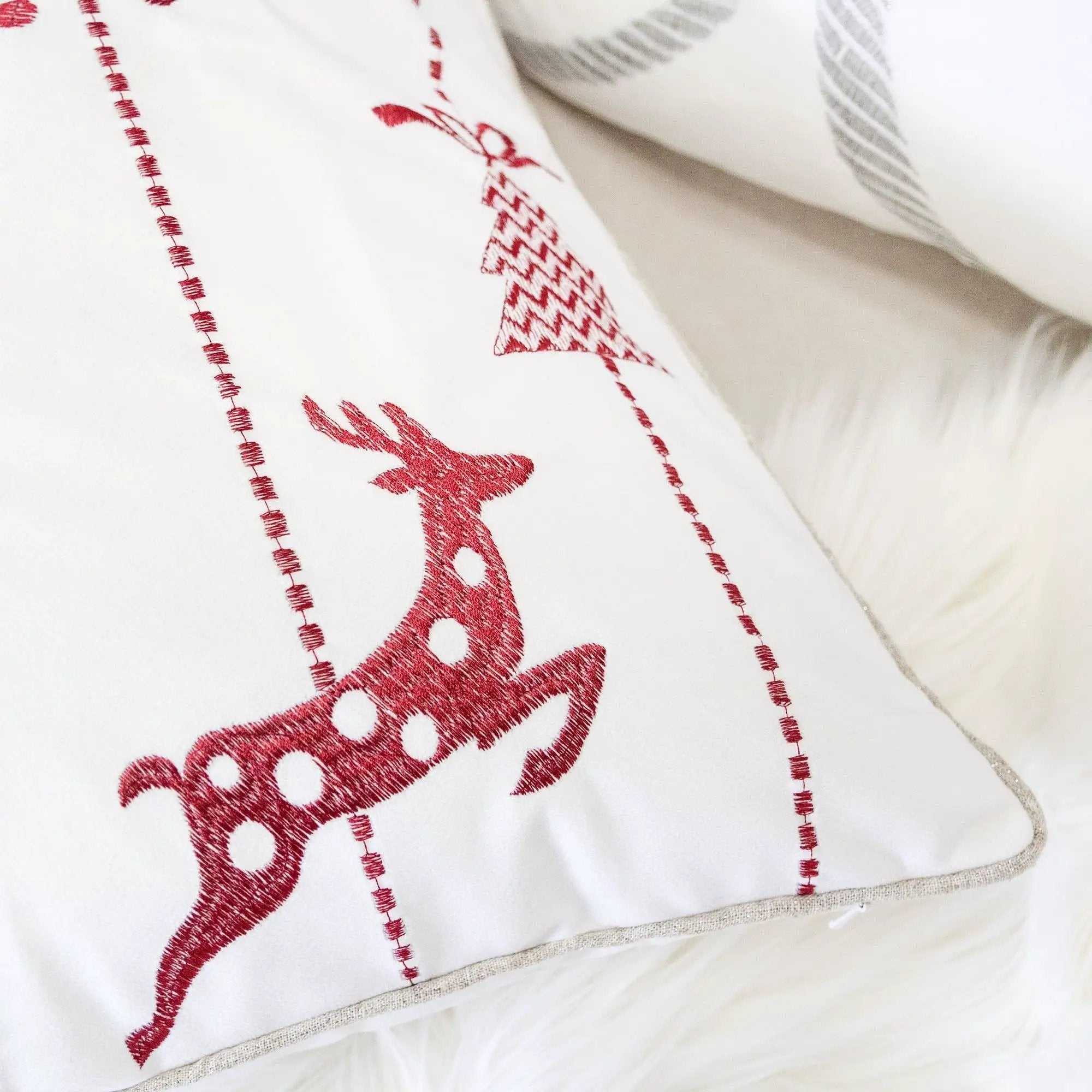 Christmas Throw Pillow With Embroidered Reindeer And Snowflakes - White by HouseOfZazla
