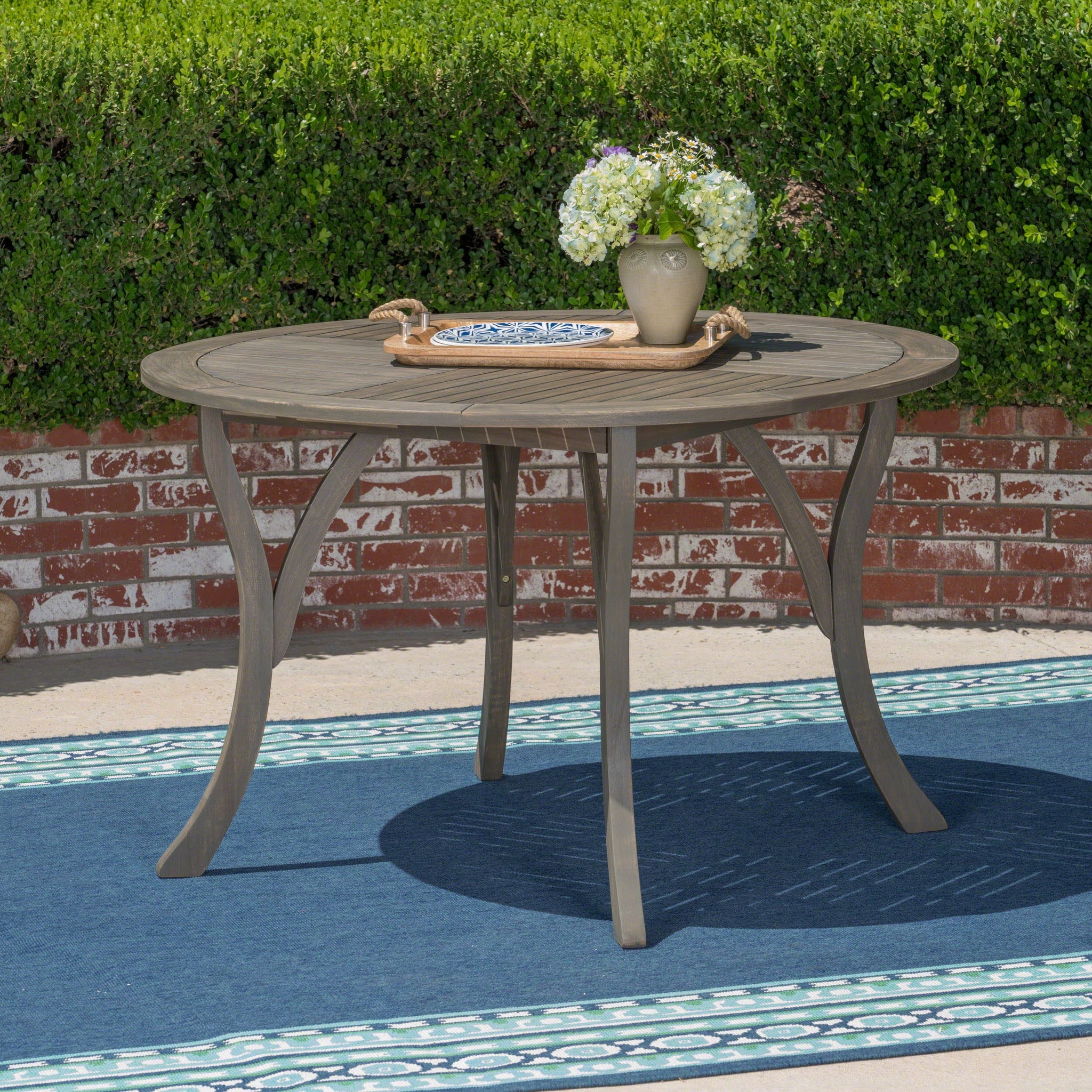 Outdoor Acacia Wood Round Dining Table with Curved Legs by HouseOfZazla
