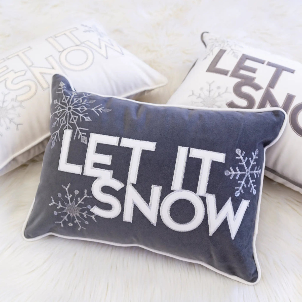 Nneka Let It Snow Lumbar Pillow by HouseOfZazla