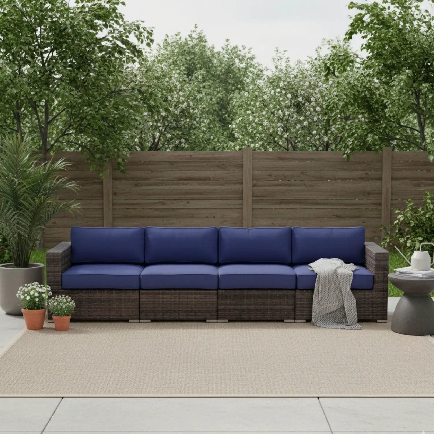 Luxurious Wicker Patio Sectional With Weather Resistant Sunbrella Cushions by Unique Piece Furniture