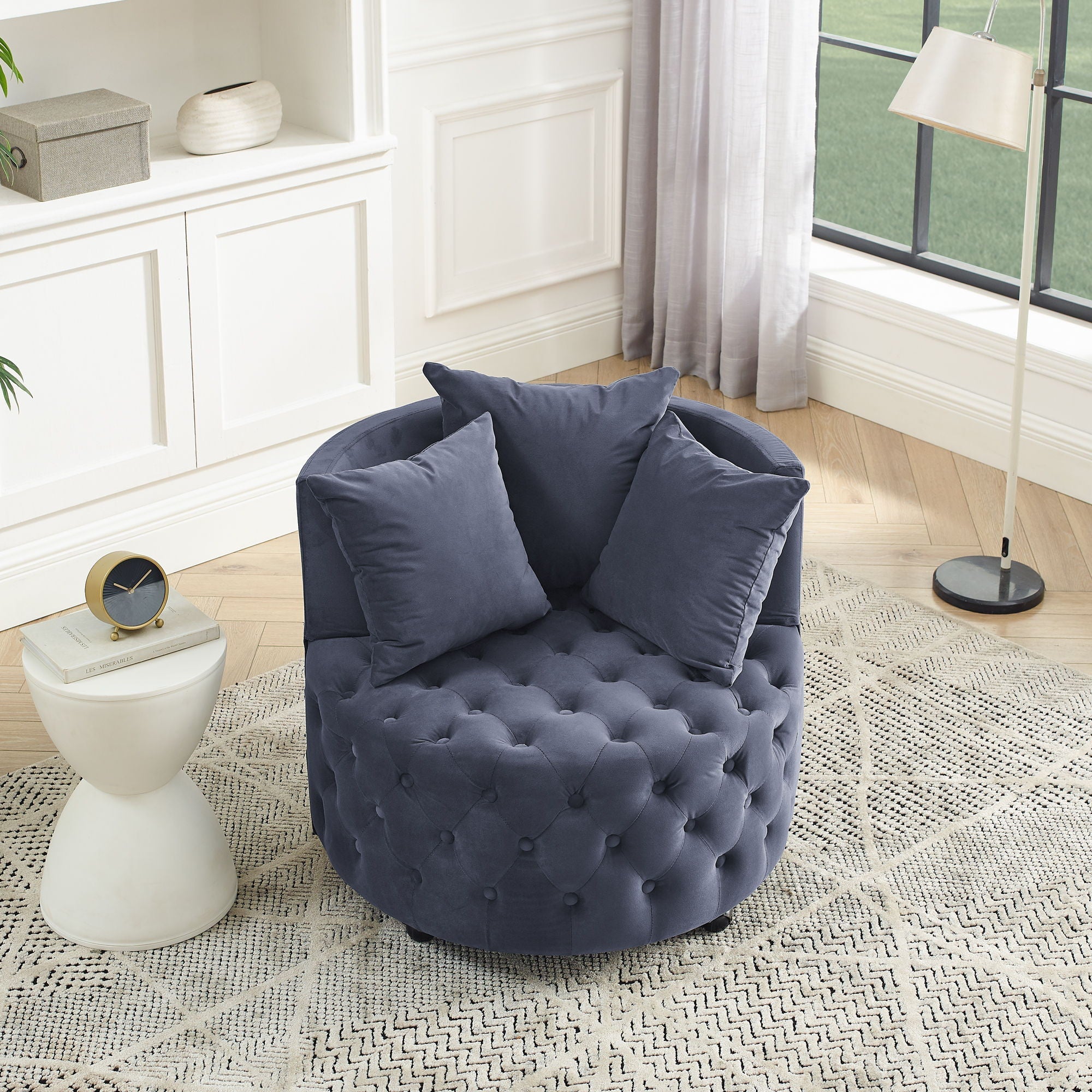 Modern Upholstered Swivel Chair With Button Tufted Design And Movable Wheels by HouseOfZazla