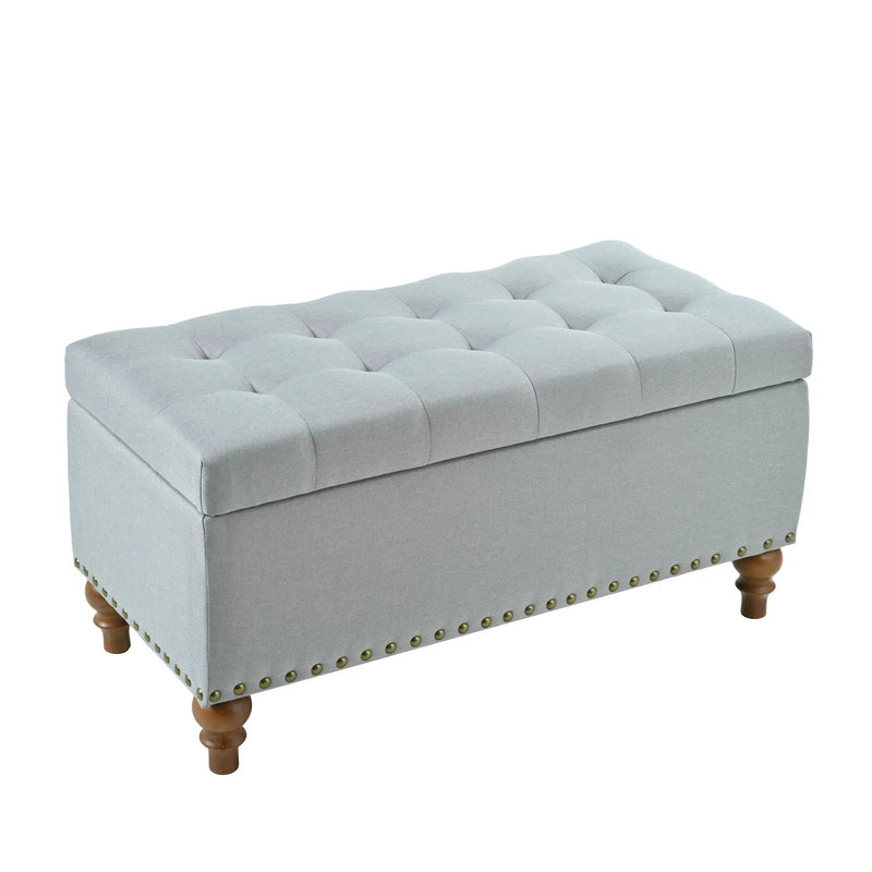 Upholstered Ottoman With Storage And Rivet Trim by HouseOfZazla