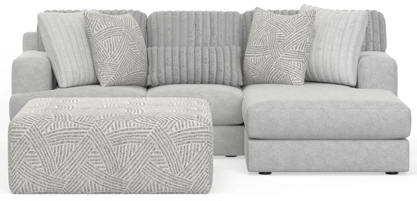 Logan - Upholstered Sectional With Comfort Coil Seating - 46" Cocktail Ottoman And Accent Pillows Included by Unique Piece Furniture