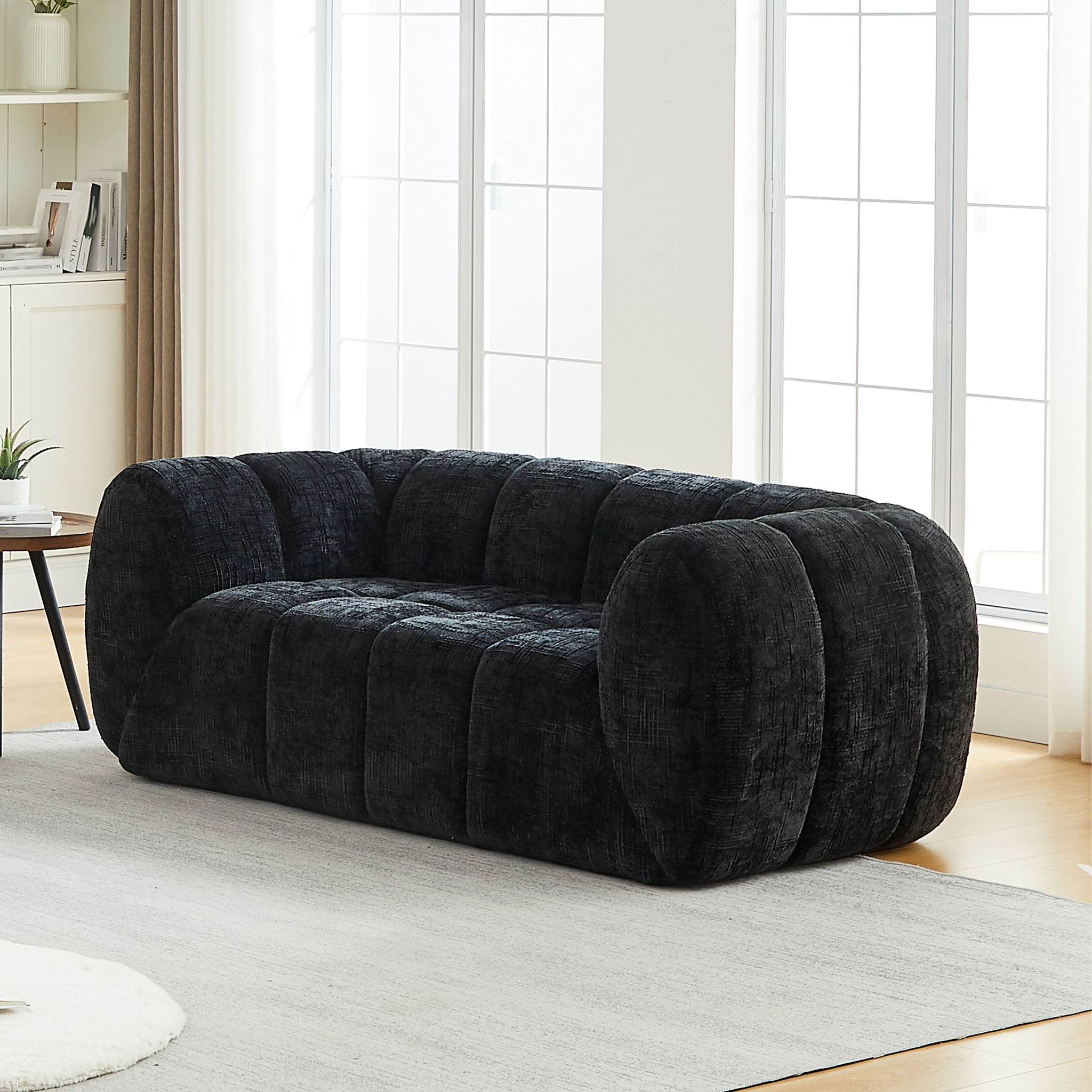 Quilted Cloud Sofa With Rounded Armrests And Piano Key Backrest Design by HouseOfZazla
