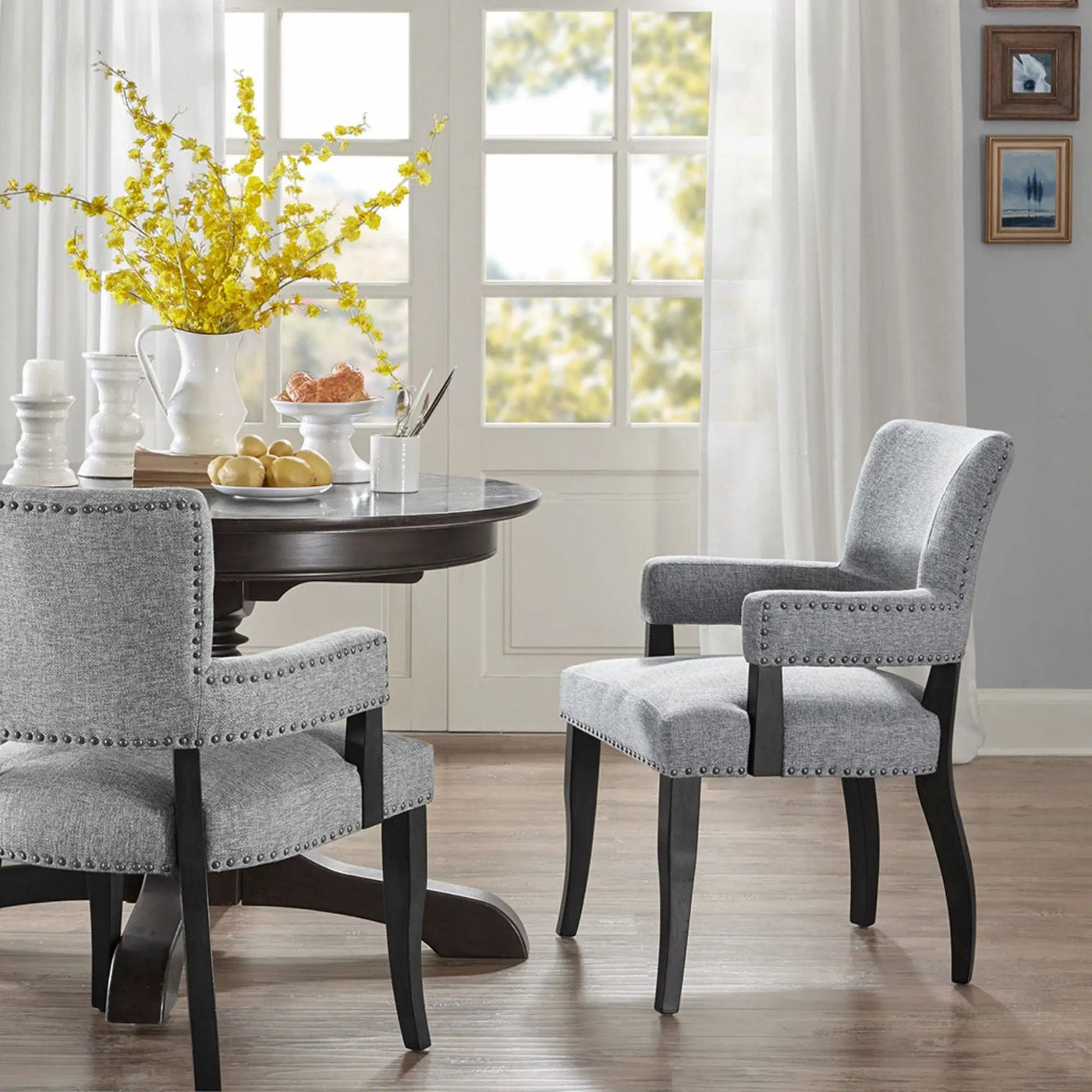 Elegant Arm Dining Chair With Brass Nail Head Detailing by HouseOfZazla