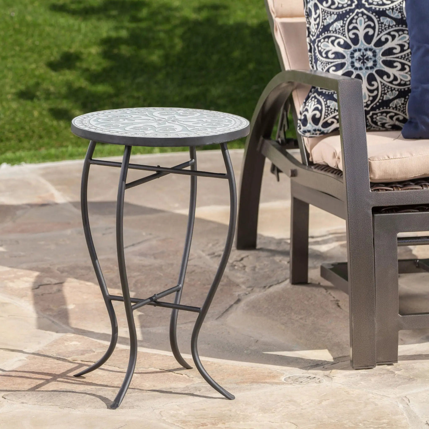 Outdoor Round Side Table With Mosaic Style Top And Curved Iron Legs by HouseOfZazla