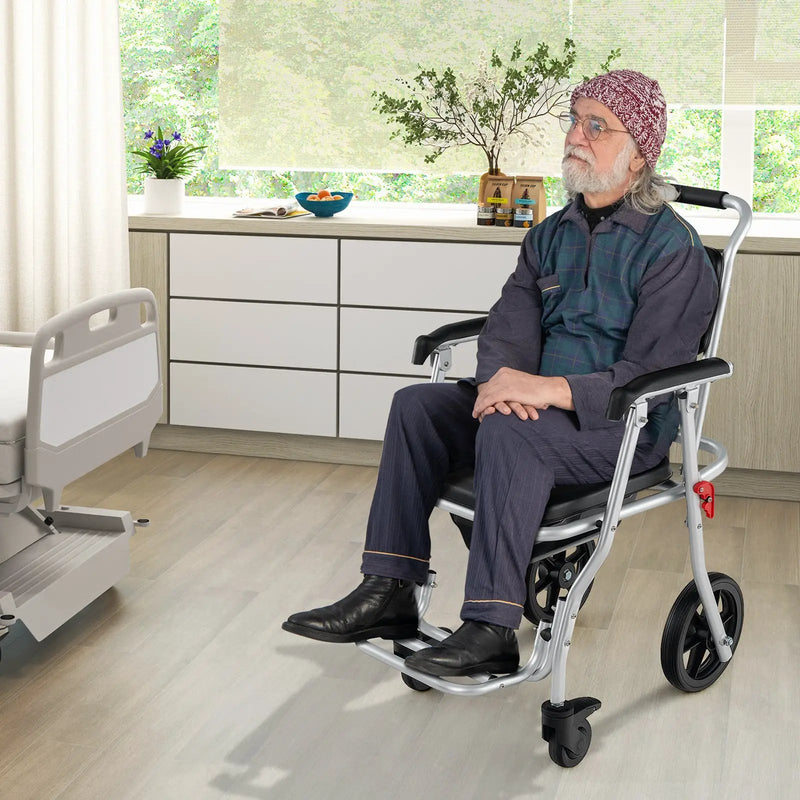 4-in-1 Foldable Bedside Commode Chair with Brakes and Bucket and Footrest by DirectDeals