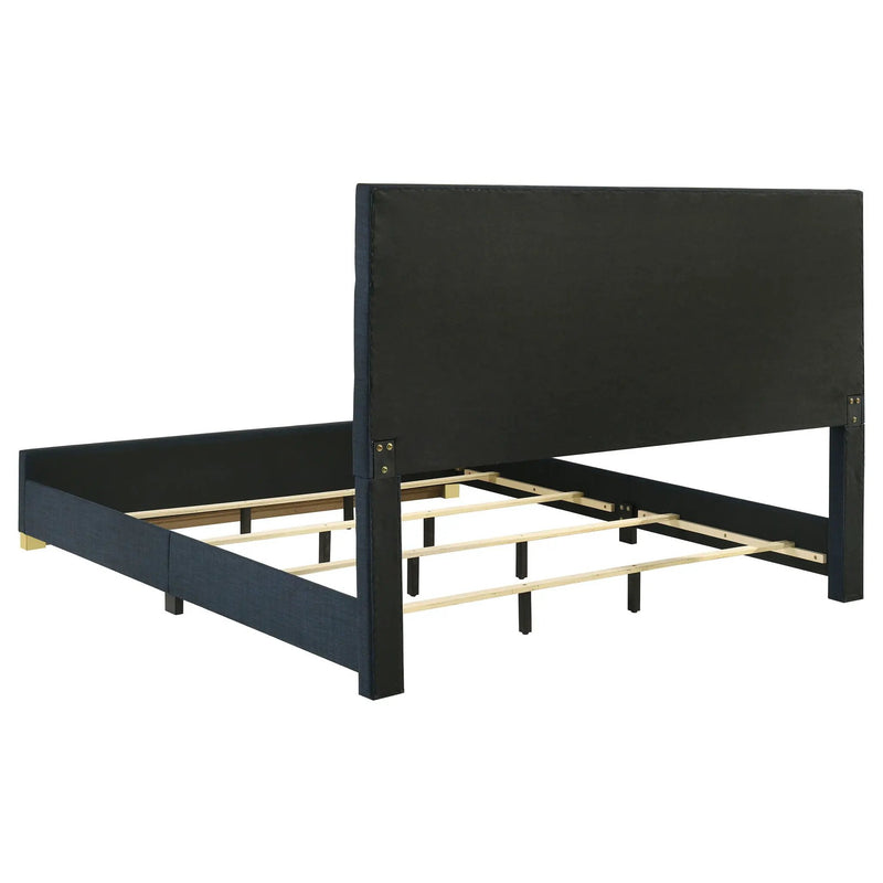 Ines 56-inch Fabric Upholstered Eastern King Panel Bed Navy by Unique Piece Furniture