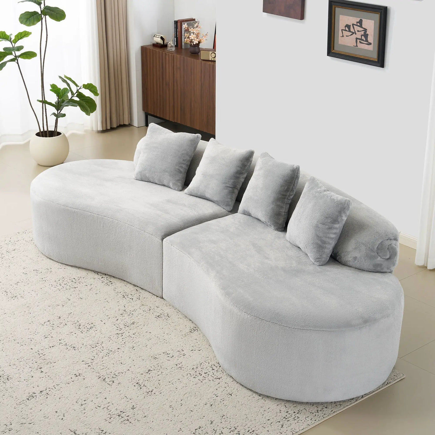 Modern Curved Sofa With Pillows by HouseOfZazla