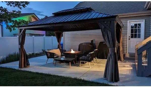 Kozyard Alexander 12‘ X 16’ Hardtop Aluminum Permanent Gazebo with a Mosquito Net and Privacy Sidewalls, Permanent Gazebo Pavilion for Patio, Backyard (Alexander 12'x16' (Brown)) by GreenHaven Gardens