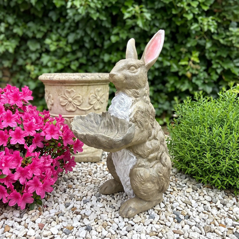 Magnesium Oxide Bunny Statue Holding Decor by HouseOfZazla