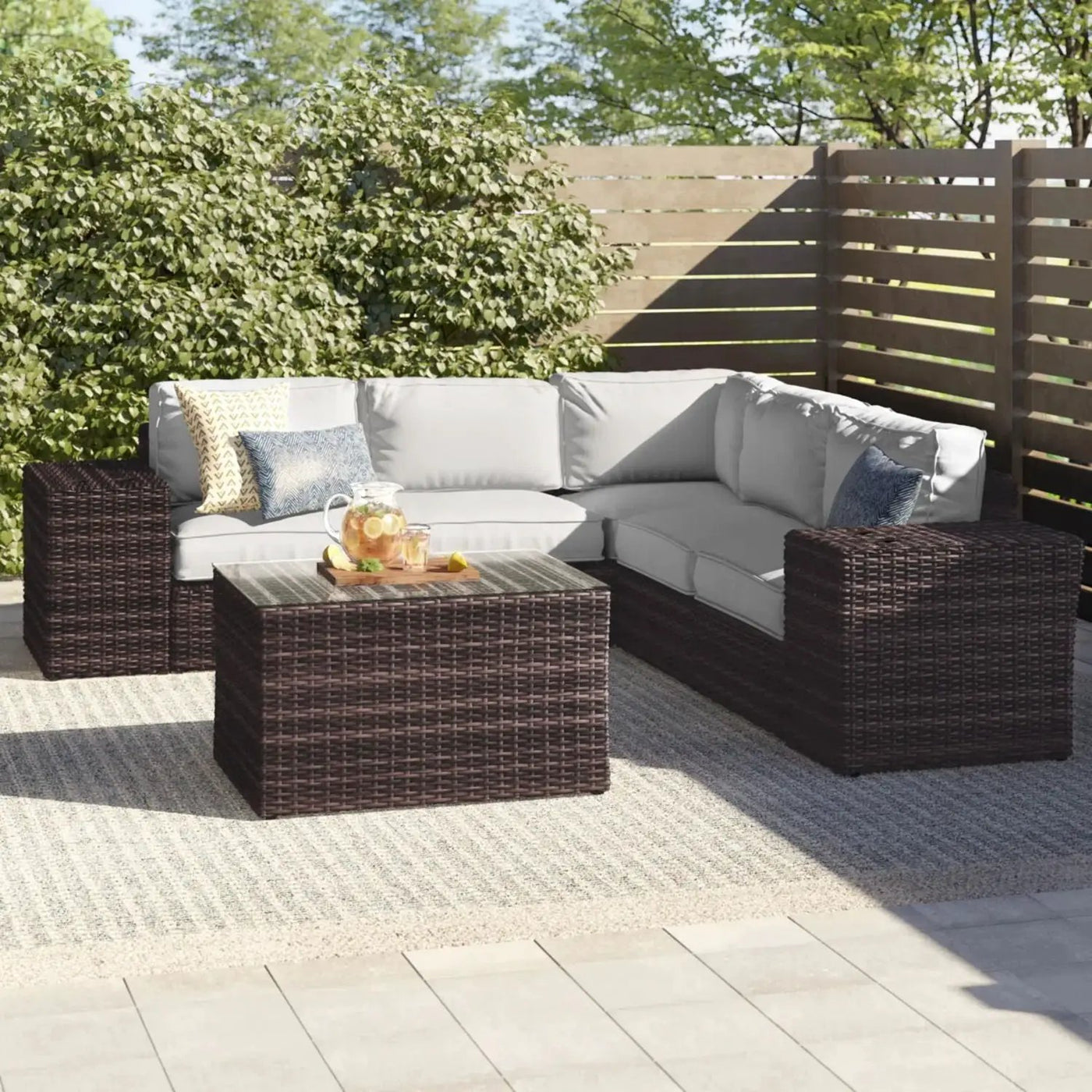 Modern Patio Rattan Sectional Set With Cushions by Unique Piece Furniture