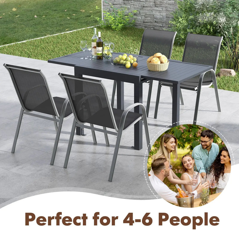 Outdoor Dining Table Set with Extendable Aluminum Table and 4 Stackable Chairs by DirectDeals