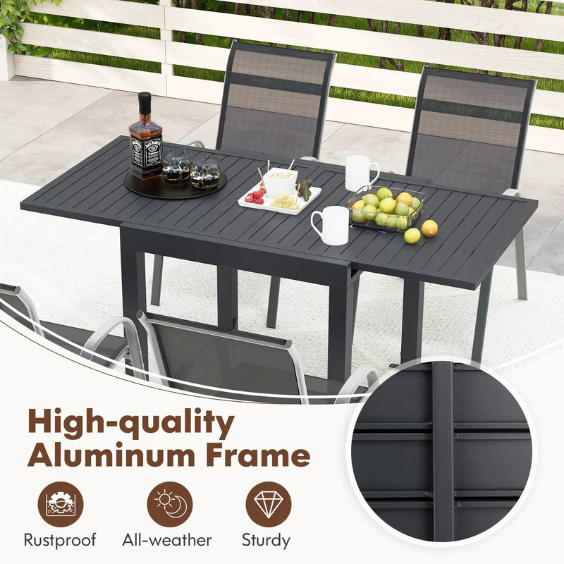 Outdoor Dining Table Set with Extendable Aluminum Table and 4 Stackable Chairs by DirectDeals