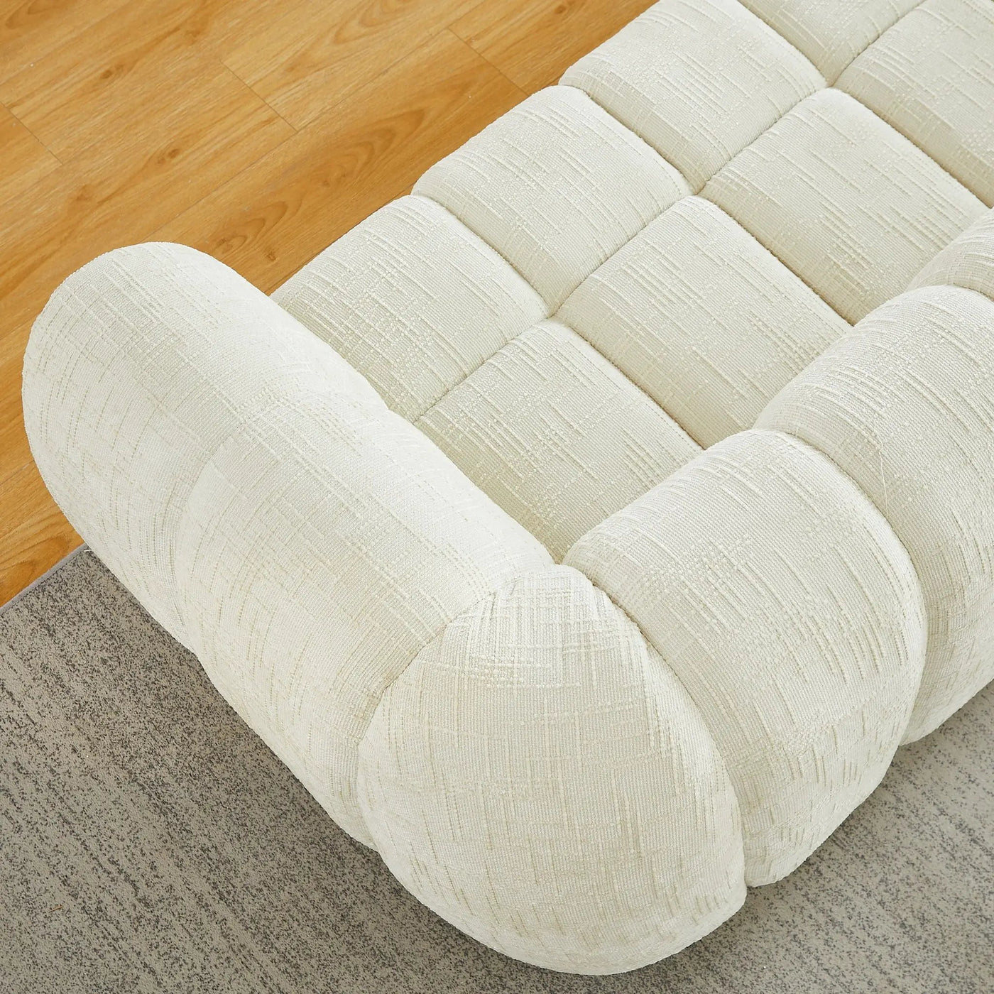 Quilted Cloud Sofa With Rounded Armrests And Piano Key Backrest Design by HouseOfZazla
