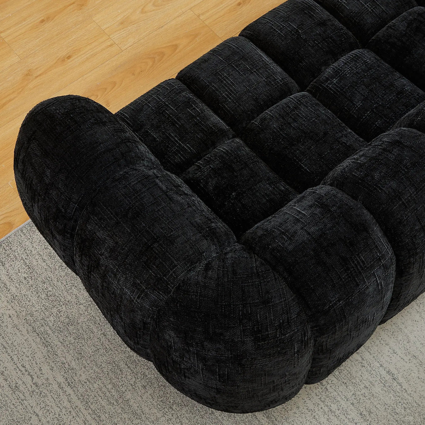 Quilted Cloud Sofa With Rounded Armrests And Piano Key Backrest Design by HouseOfZazla
