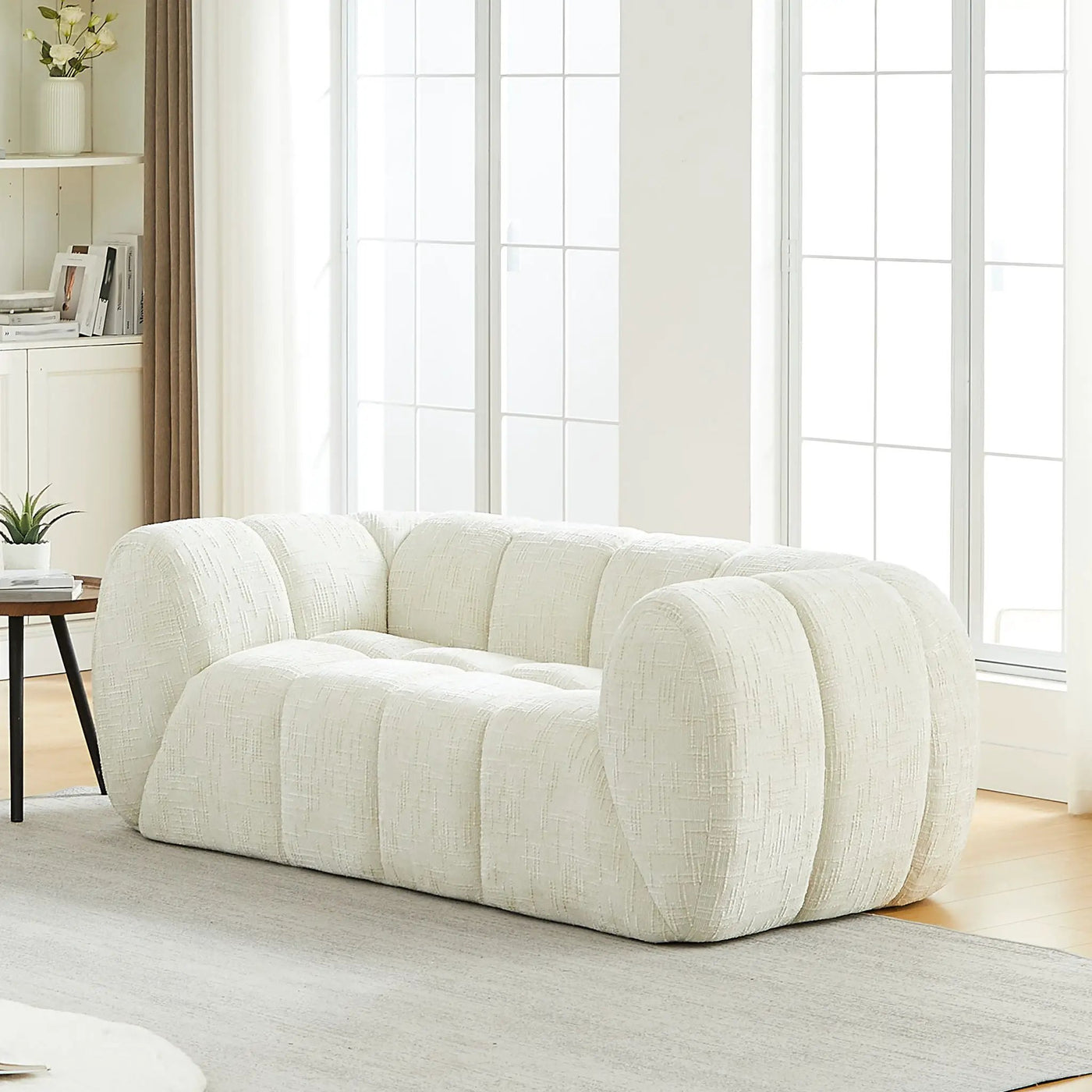 Quilted Cloud Sofa With Rounded Armrests And Piano Key Backrest Design by HouseOfZazla