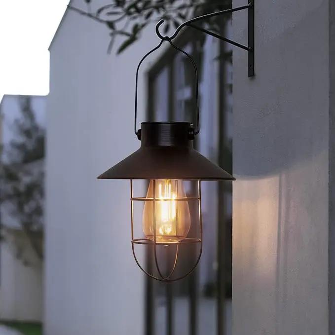 pearlstar Solar Lanterns Outdoor Metal Solar Powered Hanging Lights Waterproof for Wall Yard Garden Patio Garage Balcony Porch Fence Decor, Warm White Edison Bulb,with Wall Mount Kit（Black-1pack） by GreenHaven Gardens