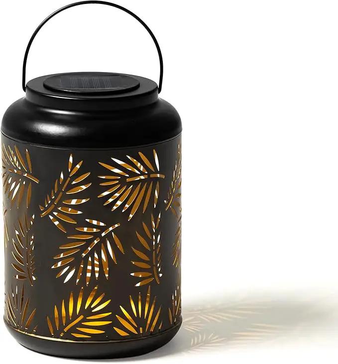 Glitzhome Solar Lantern Black Metal Cutout Leaf Outdoor Hanging Solar Light with Handle for Garden Patio Yard Outdoor Decor by GreenHaven Gardens