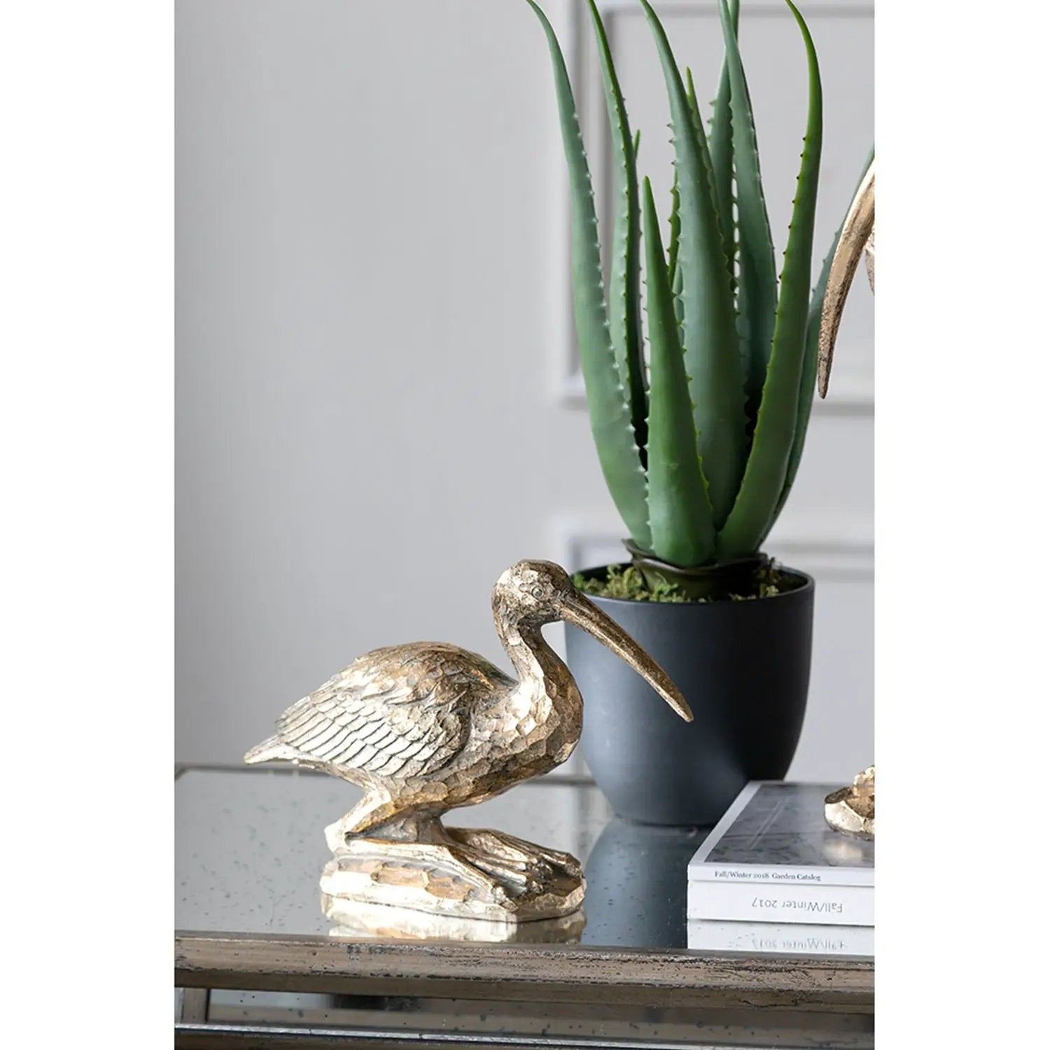 7.1x10.4x3" Kneeling Crane Figurine by HouseOfZazla
