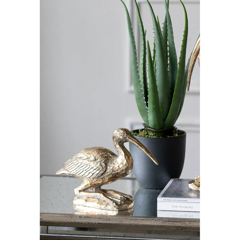 7.1x10.4x3" Kneeling Crane Figurine by HouseOfZazla