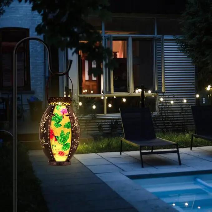 Starsoul Flamingo + Hummingbird Solar Lantern Solar Hot Air Balloon Flickering Flame Hanging Garden Light Stained Glass & Metal Outdoor Lantern Waterproof Hummingbird Hanging Lantern by GreenHaven Gardens