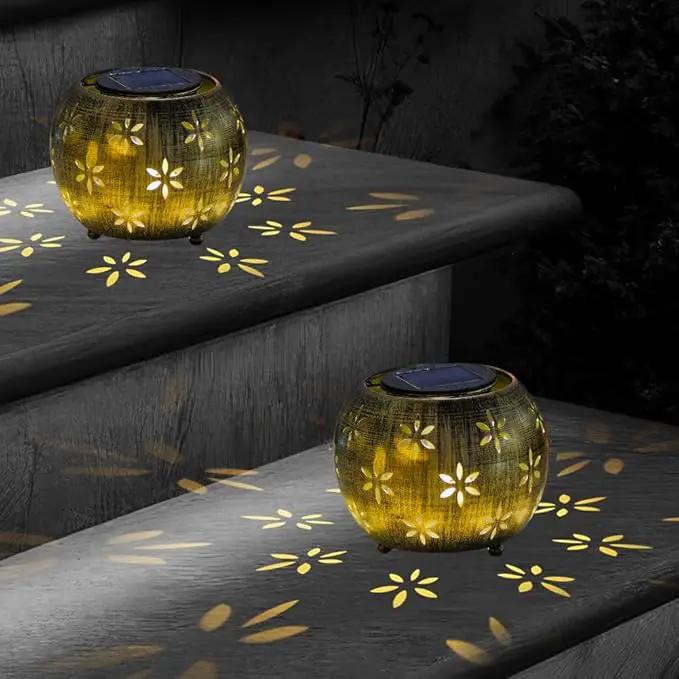VEWOGARDEN 2 Pack Solar Lanterns Outdoor Waterproof Solar Lantern Hollow Out Metal Lantern Solar Lights for Patio Garden Table Decor by GreenHaven Gardens