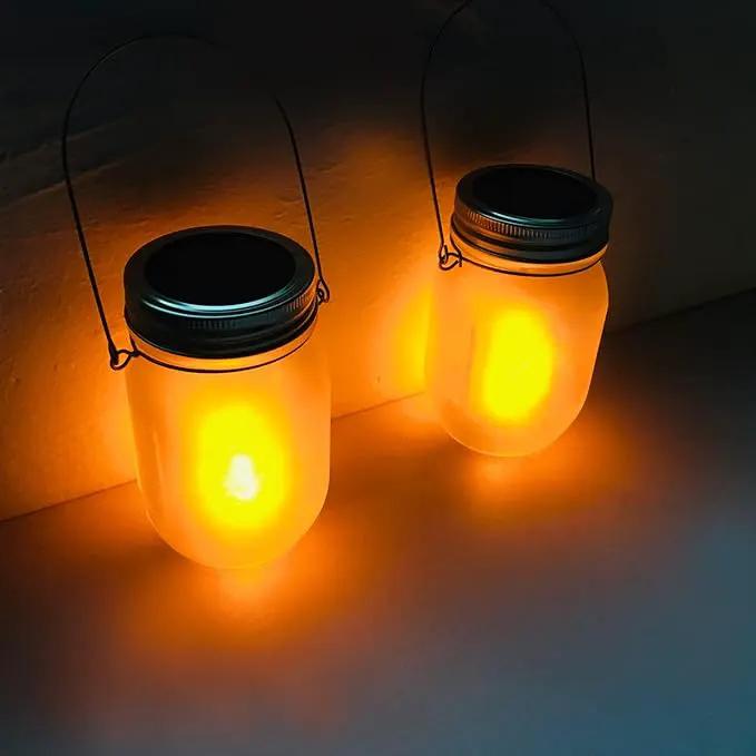 Solar Mason Jar Flicker Lights Upgraded, 4 Pack Flickering Torches Lights Outdoor Hanging Lanterns Landscape Decoration Lighting Dusk to Dawn Auto On/Off Security Halloween Torch Lights by GreenHaven Gardens