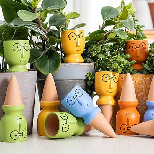Self Watering Spikes for Plants, Terracotta Slow Release Watering System - Vacation Plant Waterer, 4 Pack Automatic Plant Watering Devices for Indoor Outdoor Potted Plants by GreenHaven Gardens