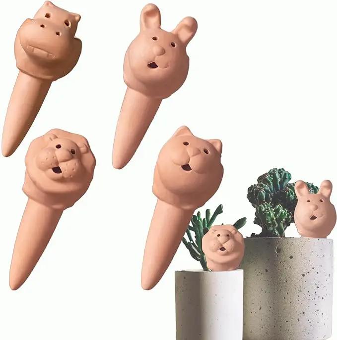 Plant Watering Devices 4 Pack Terracotta Vacation Plant Waterer Bottle Watering Stakes Slow Release Plant Watering Spikes Self Watering Devices for Indoor Outdoor Plants by GreenHaven Gardens