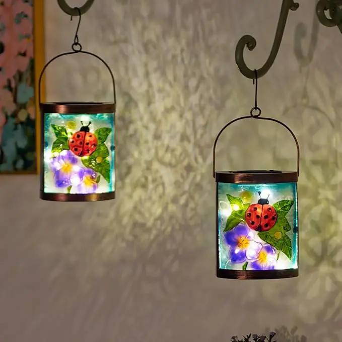 Starsoul 2 Pack Hanging Solar Lantern Outdoor Waterproof Glass Ladybug and Flowers Decorative Solar Lights for Outside Garden Yard Table Patio Decor by GreenHaven Gardens