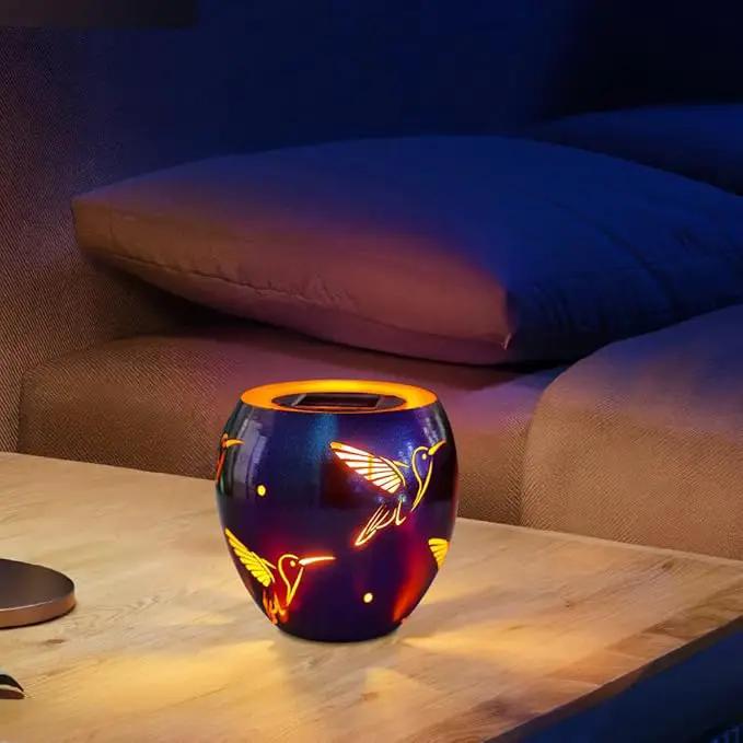VEWOGARDEN Solar Lanterns Outdoor Waterproof Hummingbird Hollowed-Out Metal Lantern Solar Lights with Flickering Flame for Patio Porch Table, Purple by GreenHaven Gardens