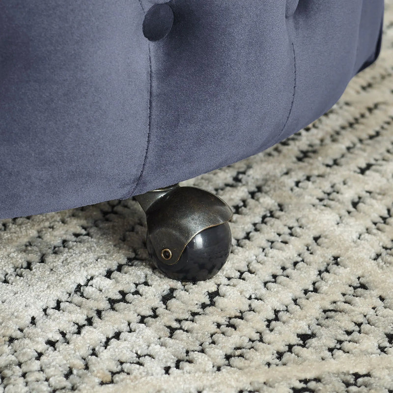 Modern Upholstered Swivel Chair With Button Tufted Design And Movable Wheels by HouseOfZazla