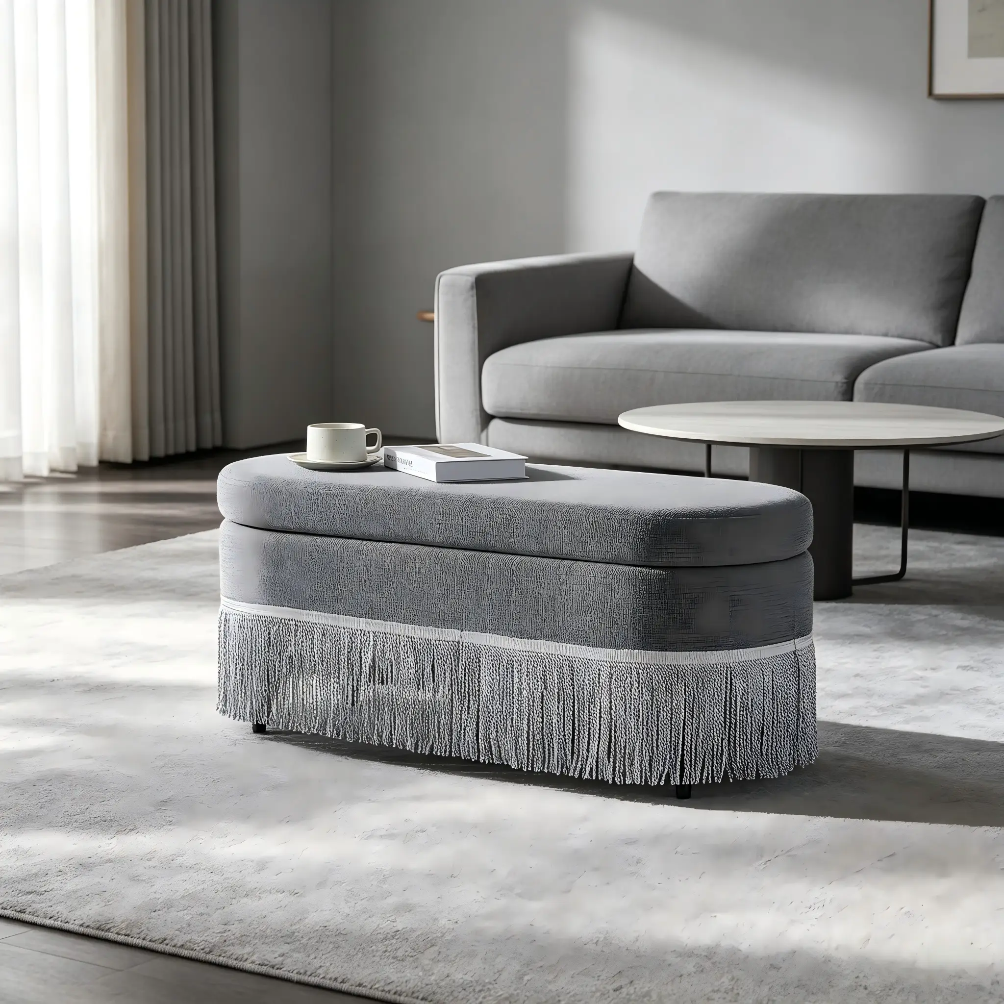Oval Upholstered Storage Ottoman with Fringe Trim by HouseOfZazla