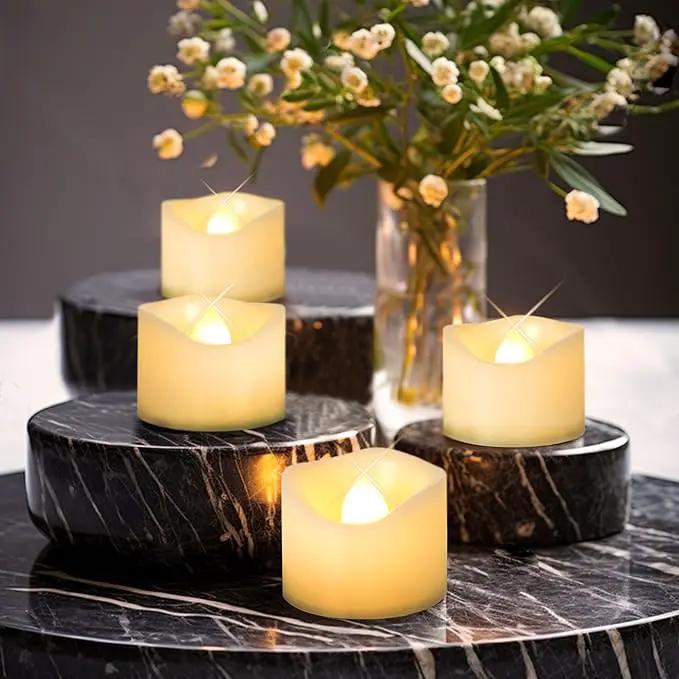 12 Pack Battery Operated Flameless LED Votive Tealight Candles Realistic Flickering Electric Tea Lights Set Bulk Halloween Pumpkin Jack O Lantern Party Wedding Decorations Centerpieces Batteries Incl. by GreenHaven Gardens