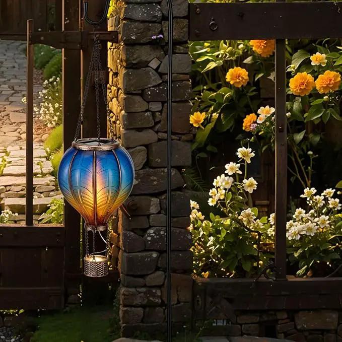 TERESA'S COLLECTIONS Hot Air Balloon Solar Lantern for Garden Decor ,Flickering Flame Hanging Solar Light for Outdoor ,Blue & Yellow Plastic Lamp for Yard Tree Gift for Mom by GreenHaven Gardens