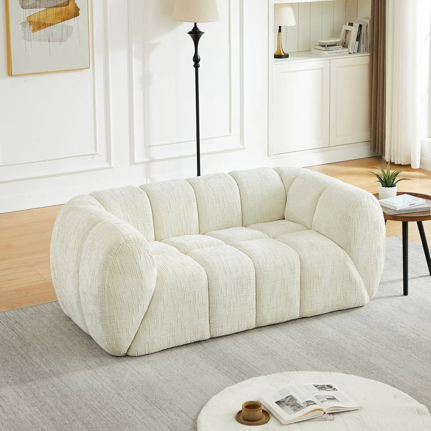 Quilted Cloud Sofa With Rounded Armrests And Piano Key Backrest Design by HouseOfZazla