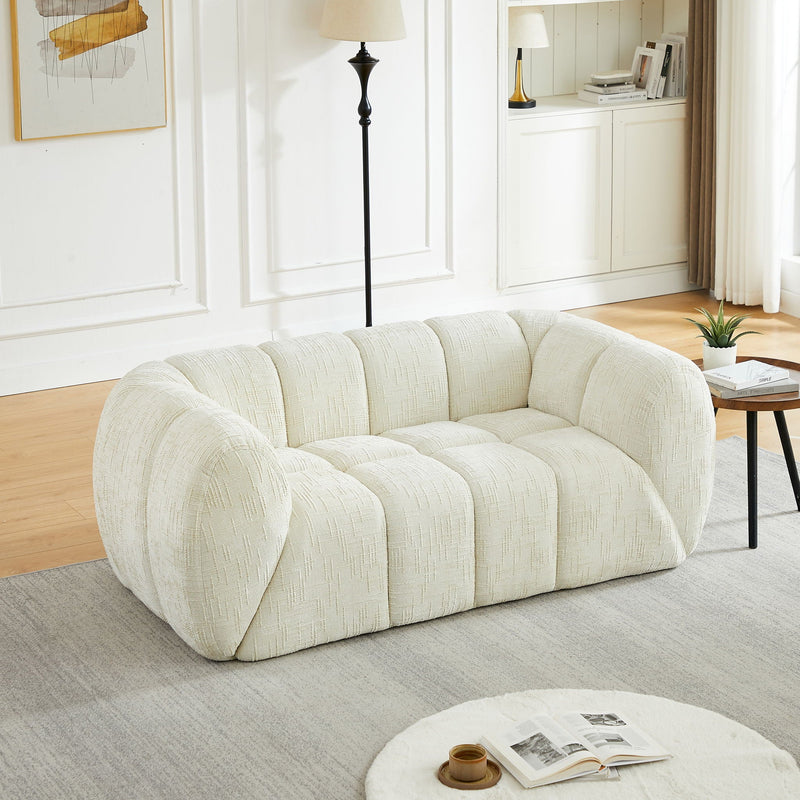 Quilted Cloud Sofa With Rounded Armrests And Piano Key Backrest Design by HouseOfZazla