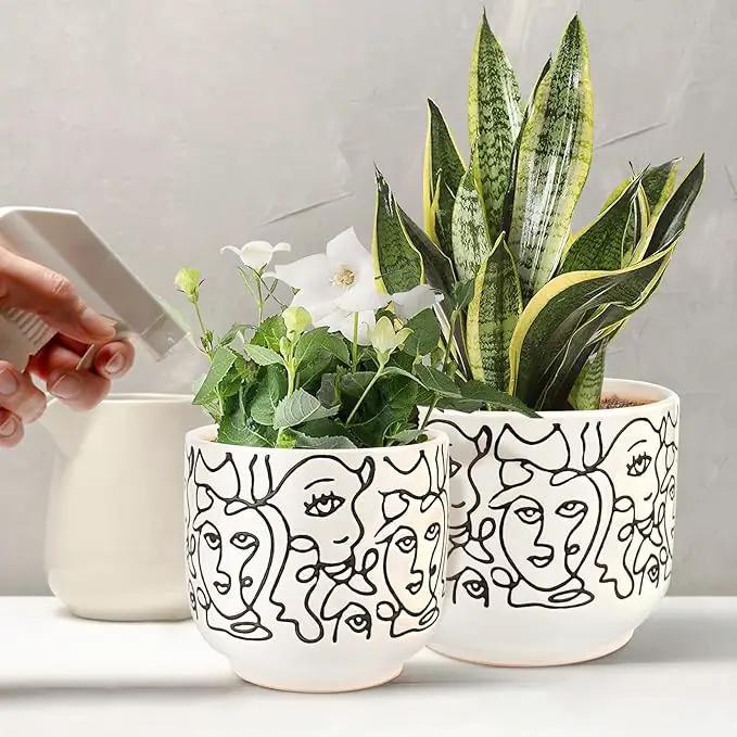 Docrin Plant Pots Indoor with Drainage : 6.6+5.4 Inch Ceramic Flower Pots for Plants - Set of 2 Modern Decorative Face Planters for House/Office/Gift - /Black and White by GreenHaven Gardens