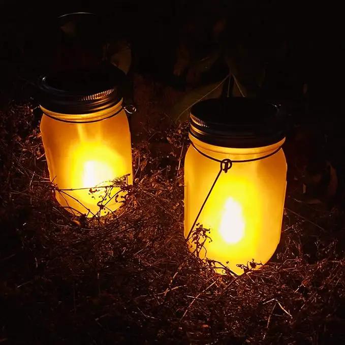 Solar Mason Jar Flicker Lights Upgraded, 4 Pack Flickering Torches Lights Outdoor Hanging Lanterns Landscape Decoration Lighting Dusk to Dawn Auto On/Off Security Halloween Torch Lights by GreenHaven Gardens