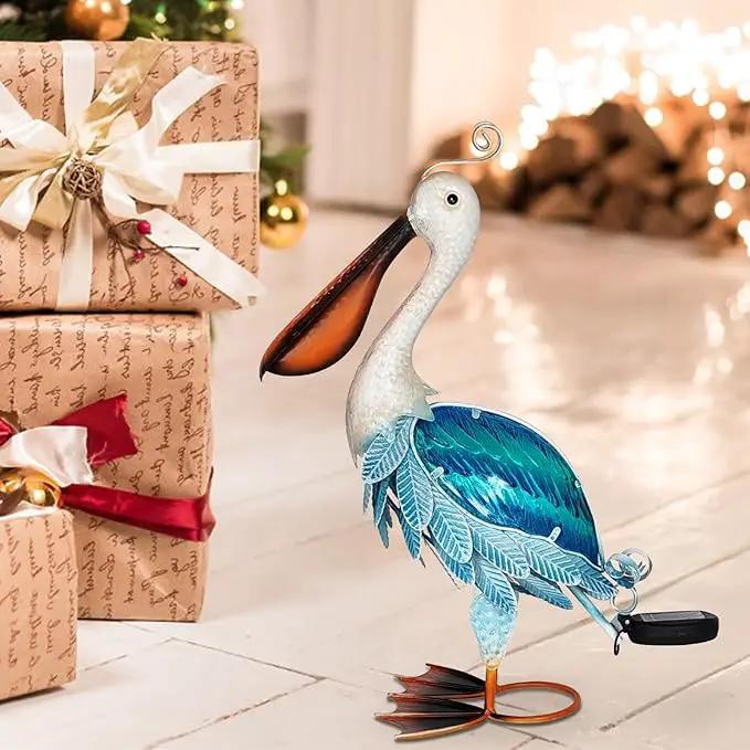 HONGLAND Solar Metal Pelican Statues Garden Sculpture & Statues, 19 Inch Glass Outdoor Pelican Yard Art Coastal Ocean Bird Decor Lawn Ornament for Backyard Porch Patio Decor（Blue） by GreenHaven Gardens