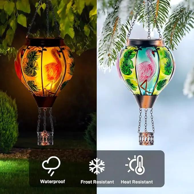 Starsoul Flamingo + Hummingbird Solar Lantern Solar Hot Air Balloon Flickering Flame Hanging Garden Light Stained Glass & Metal Outdoor Lantern Waterproof Hummingbird Hanging Lantern by GreenHaven Gardens